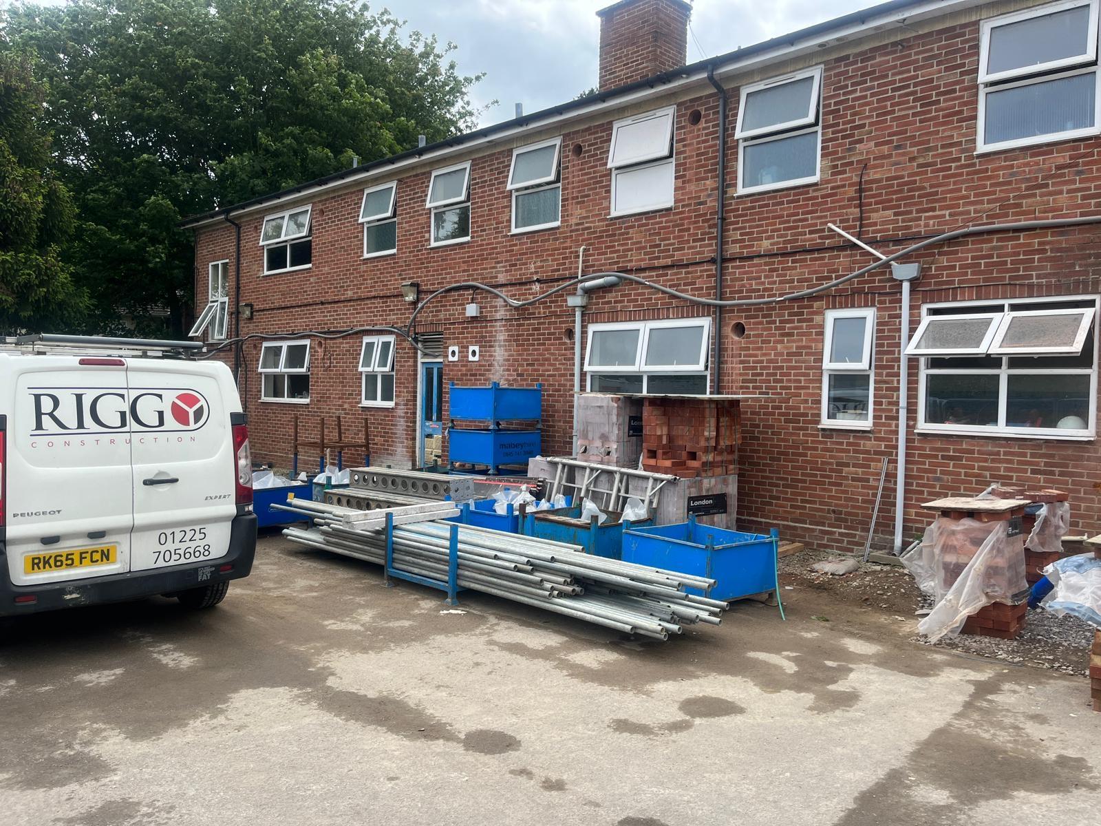 Exterior image of building supplies and van